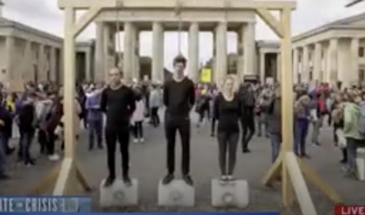 Climate protestors mock hanging