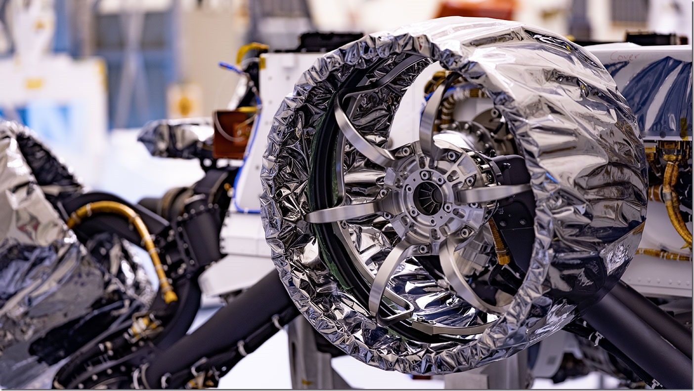 This wheel, and five others just like it, heads to Mars on NASA's Perseverance rover this summer. Wrapped in a protective antistatic foil that will be removed before launch, the wheel is 20.7 inches (52.6 centimeters) in diameter. The image was taken on March 30, 2020, at NASA's Kennedy Space Center. Credits: NASA/JPL-Caltech