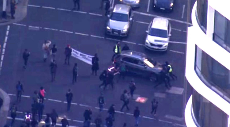 Sydney Motorist Drives Through Blockade Australia Climate Protestors