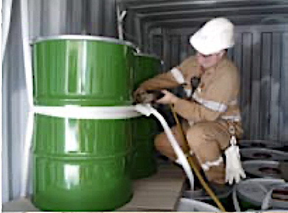 Australian Uranium Oxide Fuel being Packed into Shipping Containers